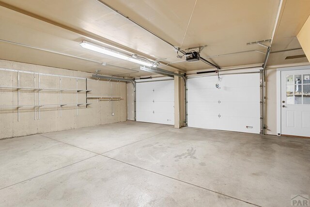 garage with a garage door opener