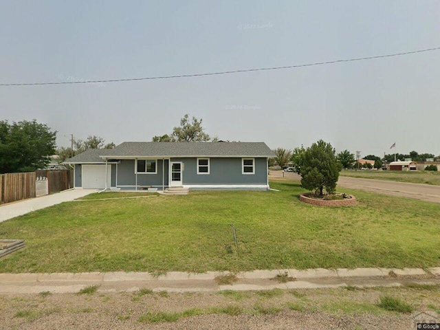 1708 W 8th St, Las Animas, CO 81054 - ranch-style home featuring driveway and an attached garage