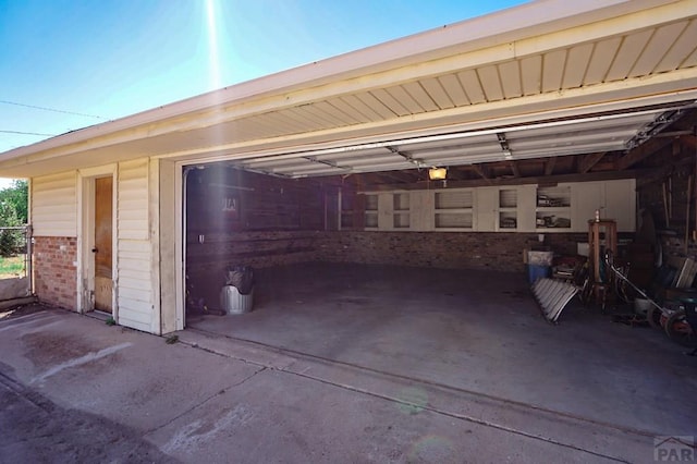 1021 7th St, Walsenburg, CO 81089 - garage featuring a garage door opener