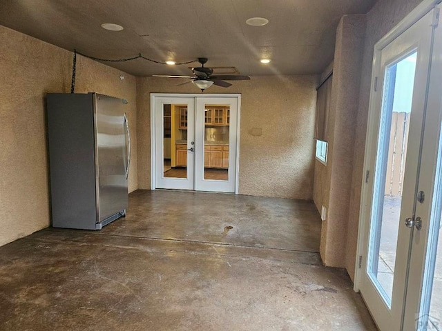 view of patio with a ceiling fan and french doors