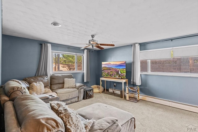 36 Loyola Ln, Pueblo, CO 81005 - living area with carpet, ceiling fan, and baseboards
