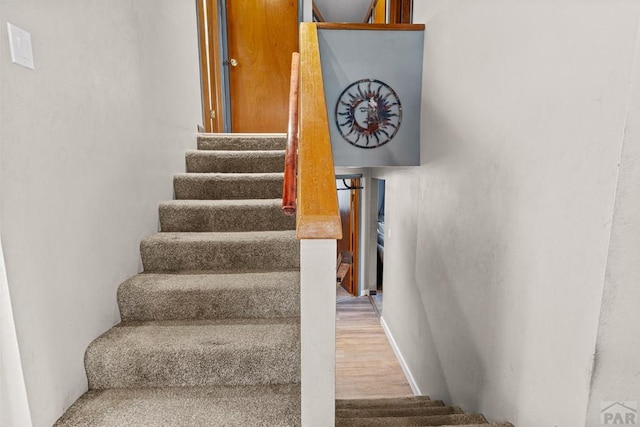 36 Loyola Ln, Pueblo, CO 81005 - staircase with wood finished floors