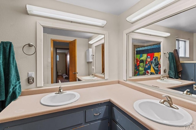 36 Loyola Ln, Pueblo, CO 81005 - bathroom featuring double vanity