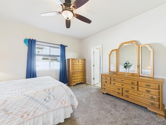 carpeted bedroom with a ceiling fan