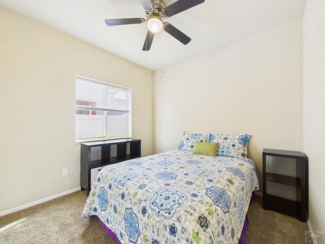 bedroom with carpet flooring, a ceiling fan, and baseboards