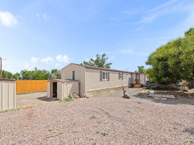 353 E Byrd Dr, Pueblo West, CO 81007 - rear view of house featuring a shed