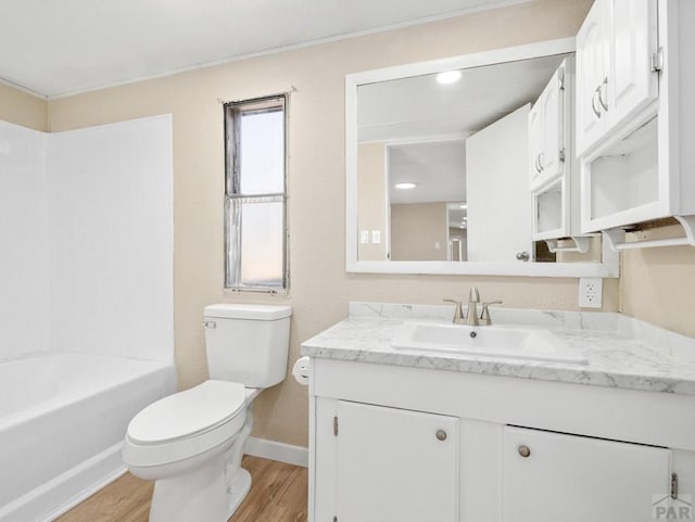 353 E Byrd Dr, Pueblo West, CO 81007 - full bath with vanity, wood finished floors, and bathtub / shower combination