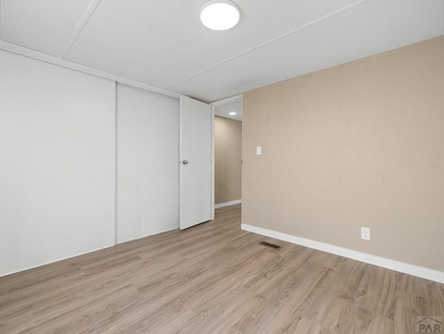 353 E Byrd Dr, Pueblo West, CO 81007 - empty room with wood finished floors and baseboards