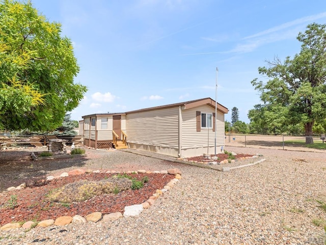 353 E Byrd Dr, Pueblo West, CO 81007 - back of house featuring entry steps