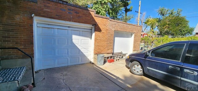 927 E 11th St, Pueblo, CO 81001 - garage with concrete driveway