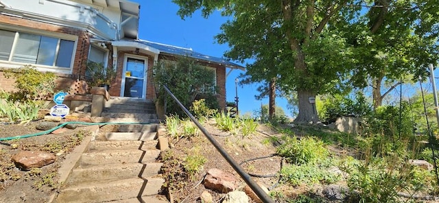 927 E 11th St, Pueblo, CO 81001 - property entrance with brick siding