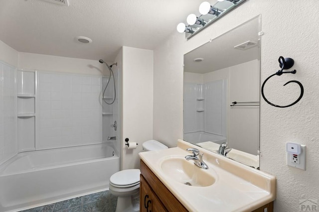 853 S Blakeland Dr, Pueblo West, CO 81007 - bathroom featuring vanity, washtub / shower combination, a textured wall, and a textured ceiling