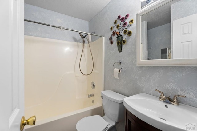 853 S Blakeland Dr, Pueblo West, CO 81007 - bathroom featuring vanity,  shower combination, and a textured wall