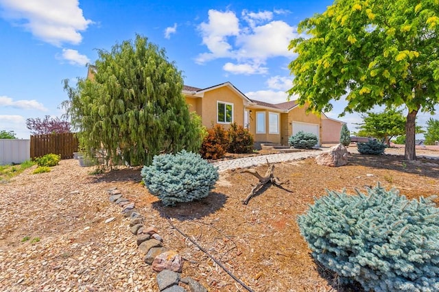 853 S Blakeland Dr, Pueblo West, CO 81007 - view of front of property featuring stucco siding and an attached garage