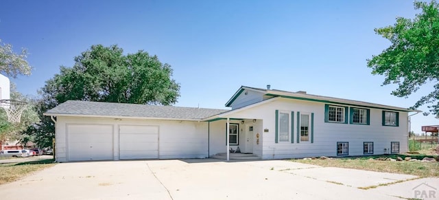 180 Welton Ave, Walsenburg, CO 81089 - view of front of property with a garage and driveway