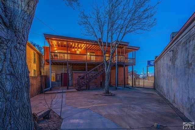 901 E C St, Pueblo, CO 81003 - patio terrace at dusk with fence and stairs
