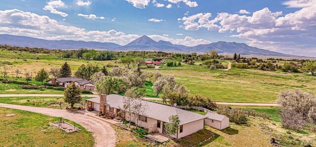 mountain view featuring a rural view