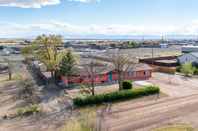 bird's eye view with a residential view and a mountain view