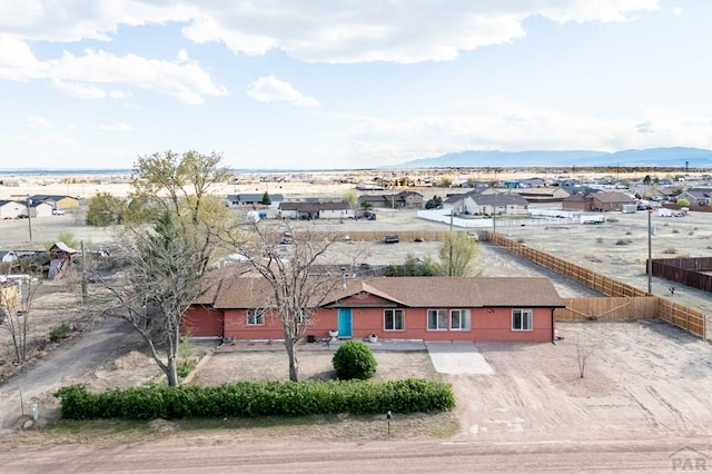 drone / aerial view with a mountain view and a residential view