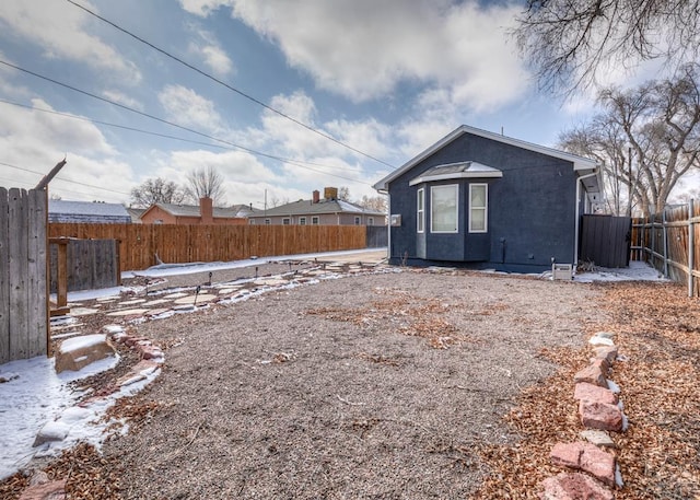 exterior space featuring a fenced backyard