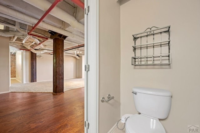 201 Lamkin Unit 205, Pueblo, CO 81003 - bathroom featuring toilet and wood finished floors