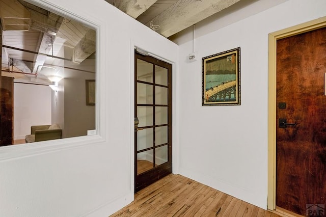 201 Lamkin Unit 205, Pueblo, CO 81003 - hall with light wood-style flooring and baseboards