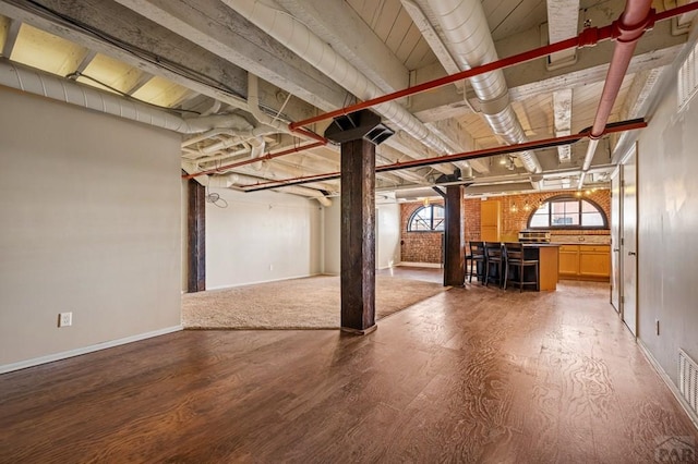 201 Lamkin Unit 205, Pueblo, CO 81003 - basement with light wood-type flooring and baseboards
