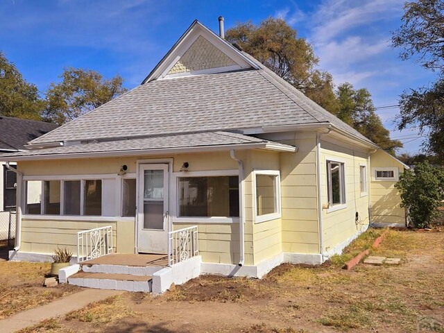 bungalow with roof with shingles