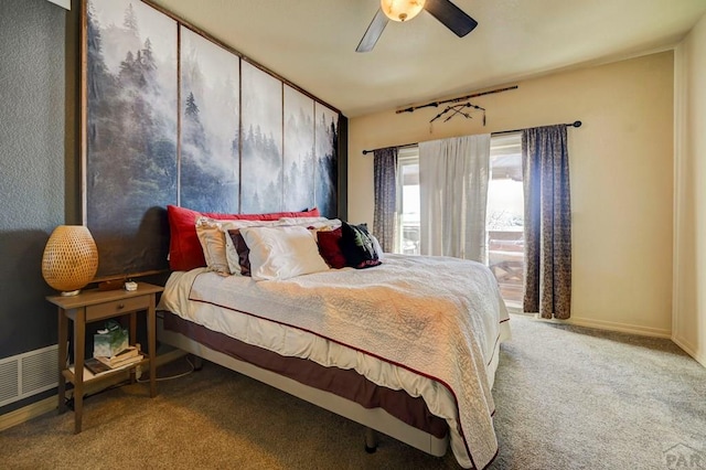 bedroom featuring a ceiling fan, carpet flooring, and baseboards