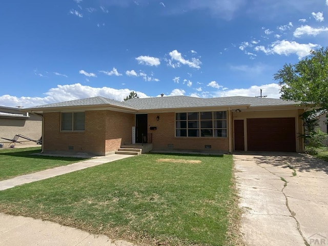 ranch-style home with a front lawn, brick siding, a garage, crawl space, and concrete driveway