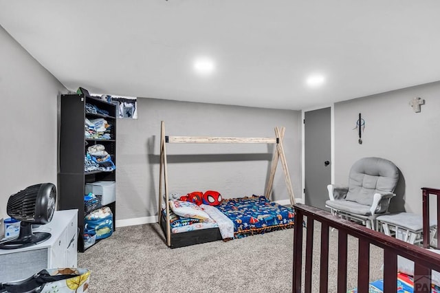 bedroom featuring baseboards and carpet flooring