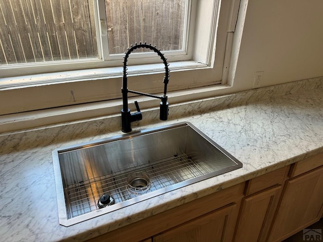 1718 E Abriendo Ave, Pueblo, CO 81004 - kitchen view of a sink and light stone counters