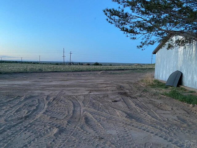 exterior space with a rural view