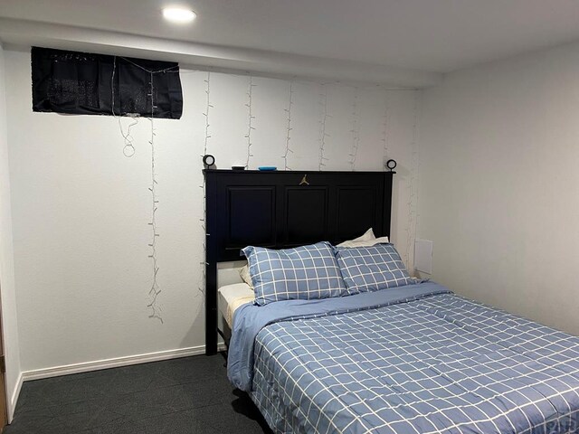 bedroom with baseboards and recessed lighting