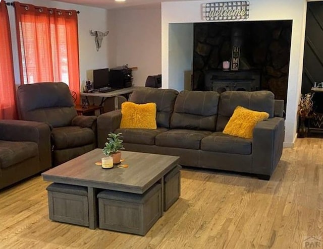 living area with light wood-style floors