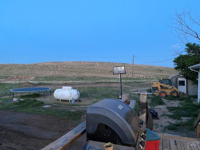 view of yard featuring a trampoline