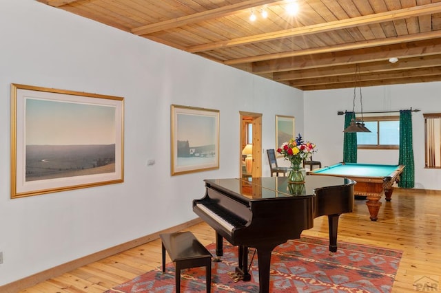 24074 Fruitland Mesa Rd, Crawford, CO 81415 - living area with hardwood / wood-style flooring, pool table, baseboards, and wooden ceiling with exposed beams