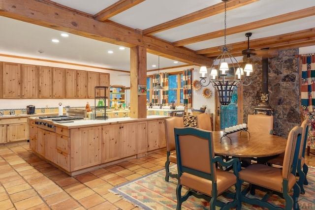 24074 Fruitland Mesa Rd, Crawford, CO 81415 - kitchen with light brown cabinetry, a chandelier, beamed ceiling, light countertops, and recessed lighting
