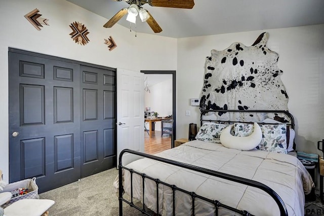 bedroom with ceiling fan and carpet flooring