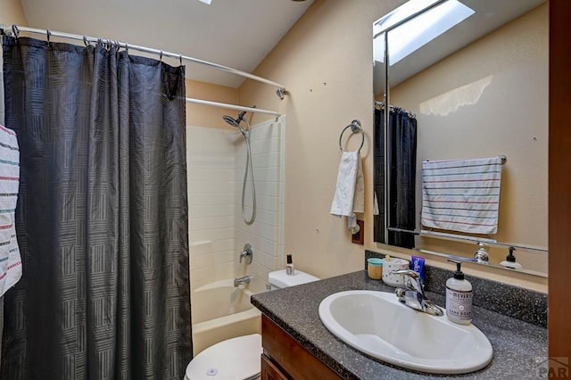 full bath featuring vanity, shower / bath combination with curtain, and toilet