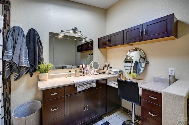 bathroom featuring tile patterned floors and vanity