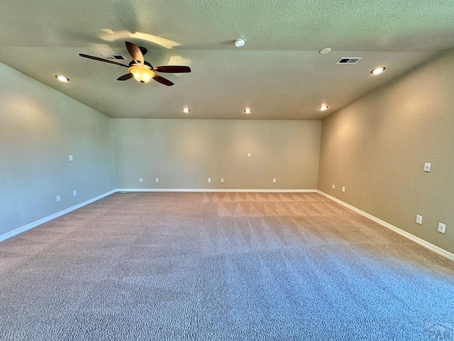 empty room with recessed lighting, ceiling fan, visible vents, and light colored carpet