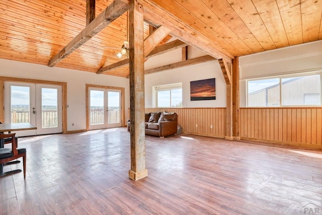 interior space featuring french doors, wooden ceiling, and wood finished floors