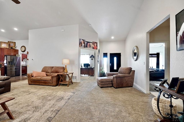 living room with light carpet, baseboards, vaulted ceiling, and recessed lighting