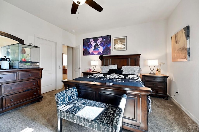 bedroom featuring ceiling fan, baseboards, and carpet floors