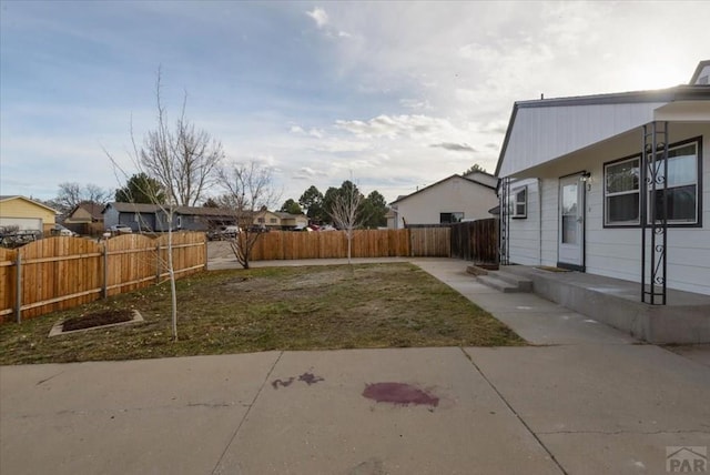 view of yard featuring a fenced backyard