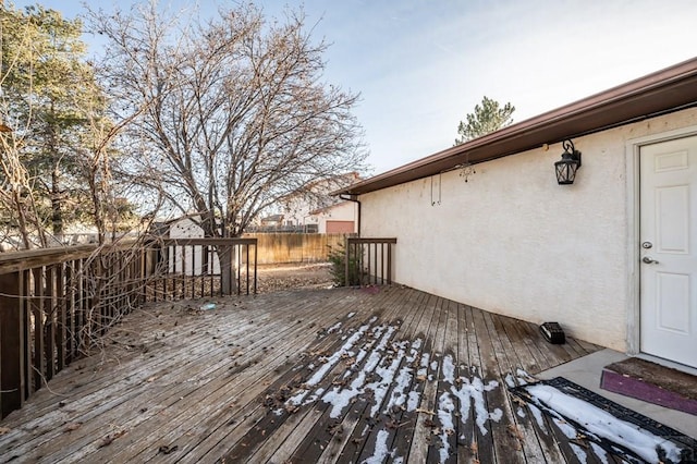 wooden deck featuring fence