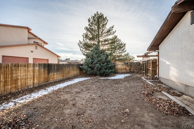 view of yard featuring a fenced backyard