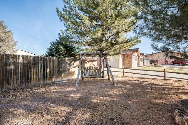 view of yard featuring fence