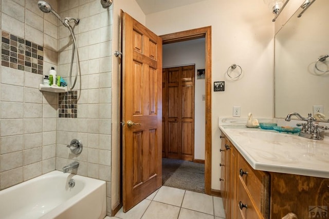 full bath featuring shower / bathtub combination, tile patterned flooring, vanity, and baseboards